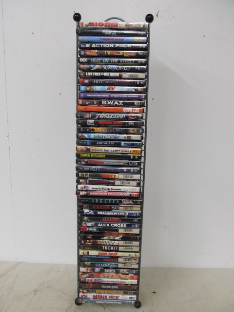 lot 58 image: Lot of Approx 50 Assorted DVDs wDisplay Stand