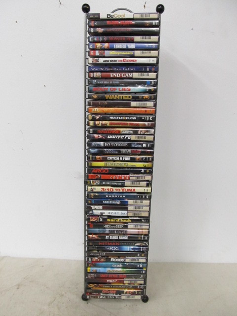 lot 59 image: Lot of Approx 50 Assorted DVDs wDisplay Stand