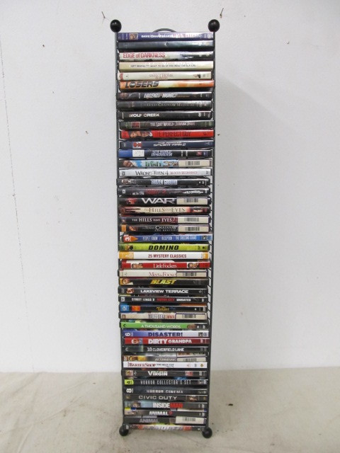 lot 60 image: Lot of Approx 50 Assorted DVDs wDisplay Stand