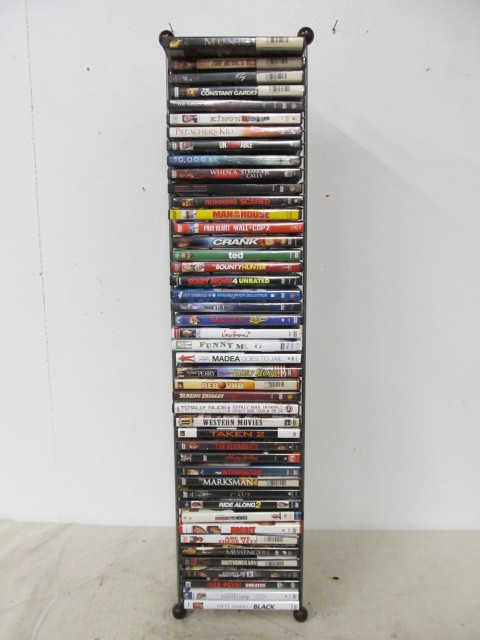 lot 61 image: Lot of Approx 50 Assorted DVDs wDisplay Stand