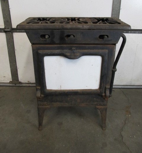 lot 130 image: Antique Cast Iron Enamel Stove