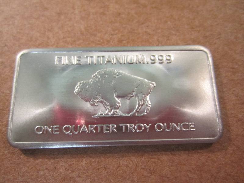 lot 1 image: Quarter Troy Ounce Fine Titanium .9...