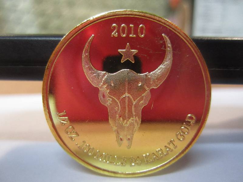 lot 11 image: 2010 12 Ounce 100 Mills 24 Karat G...