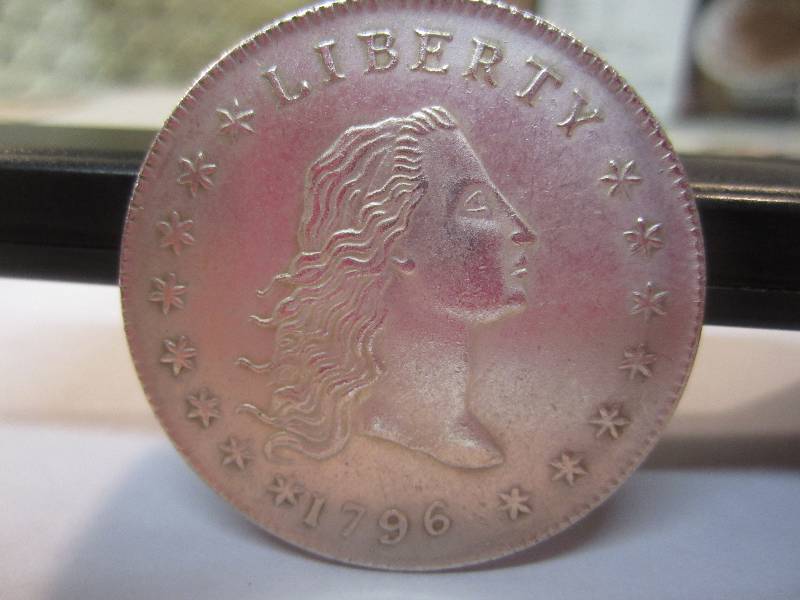 lot 18 image: 1796 Liberty Coin Sticks to Magnet...