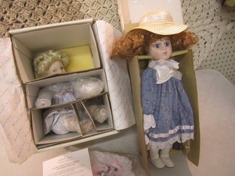 lot 104 image: 2 Porcelain Dolls The Danbury Mint ...