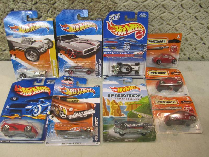 lot 299 image: Lot of 9 Hot Wheels and Matchbox Ca...