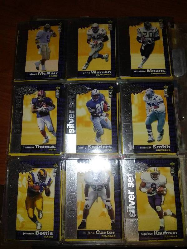 about 800 cards in Pages NFL Superstars, some NBA, MLB and NHL