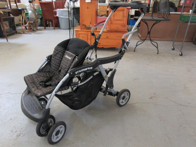 lot 108 image: SIT AND STAND STROLLER