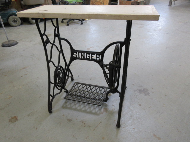 lot 150 image: SINGER TREADLE TABLE WITH STONE TOP