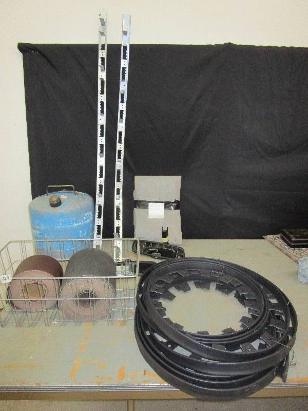 lot 53 image: Tree Rims, Car Mirrors for Toyota, Gas Can, 2000 Chevy Pickup Full Size Bed Cover Velcro, Large Rolls of Sand Paper and old Freezer Basket
