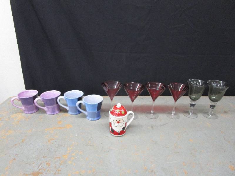 lot 66 image: Mugs- 2 Blue. 2 Purple, 2 Grey and 4 Red Stemmed Glassware, Christmas Mug