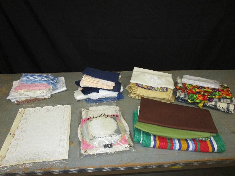 lot 83 image: Doily, table mats, apron,  table runners, etc.