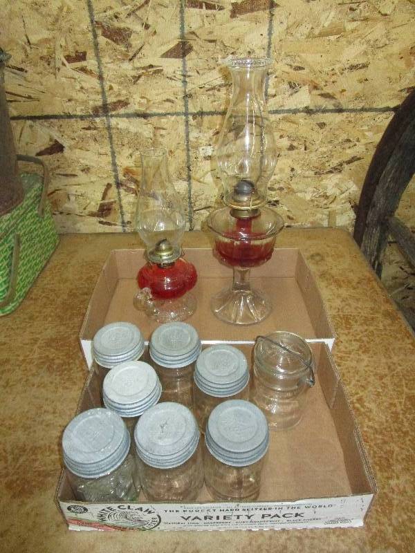 lot 134 image: 2 Oil Lamps and Old Ball Jars with Covers