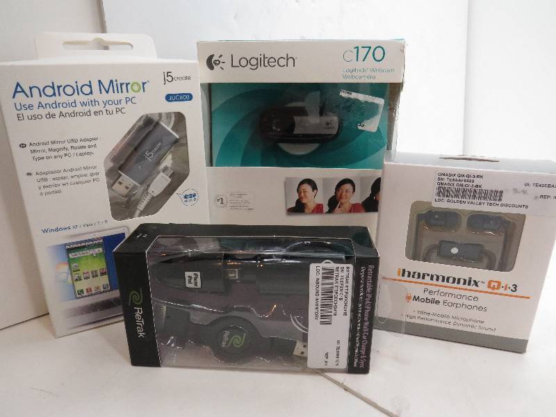 lot 4 image: Lot of phone Accs with charger, camera, head phones and a computer adapter