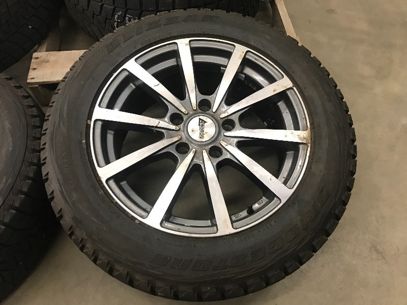 lot 24 image: Set Of (4) Bridgestone Blizzak 255...