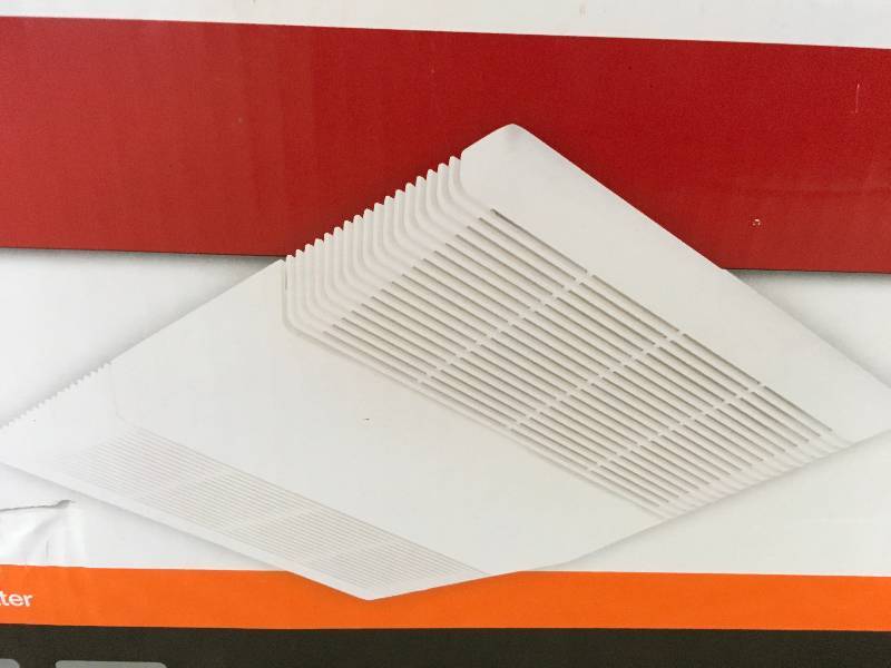 Nutone 70 CFM Ceiling Exhaust Fan with Light and 1300-Watt Heater in like new condition
