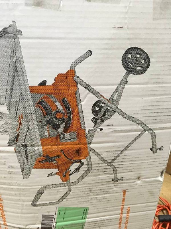 RIDGID 15 Amp 10 in. Heavy-Duty Portable Table Saw with Stand Model#  R4513 in good working conditions