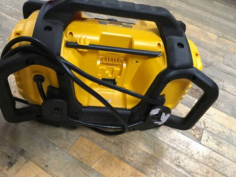 lot 14 image: Dewalt 20-Volt MAX or FLEXVOLT 60-Volt MAX Lithium-Ion Battery Charger and Bluetooth Radio