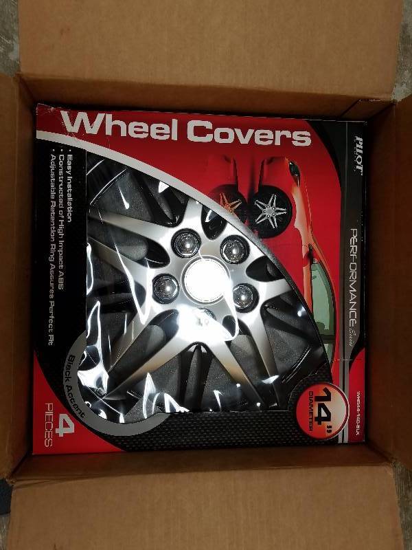 lot 961 image: Pilot Automotive 14 Wheel Covers, Black