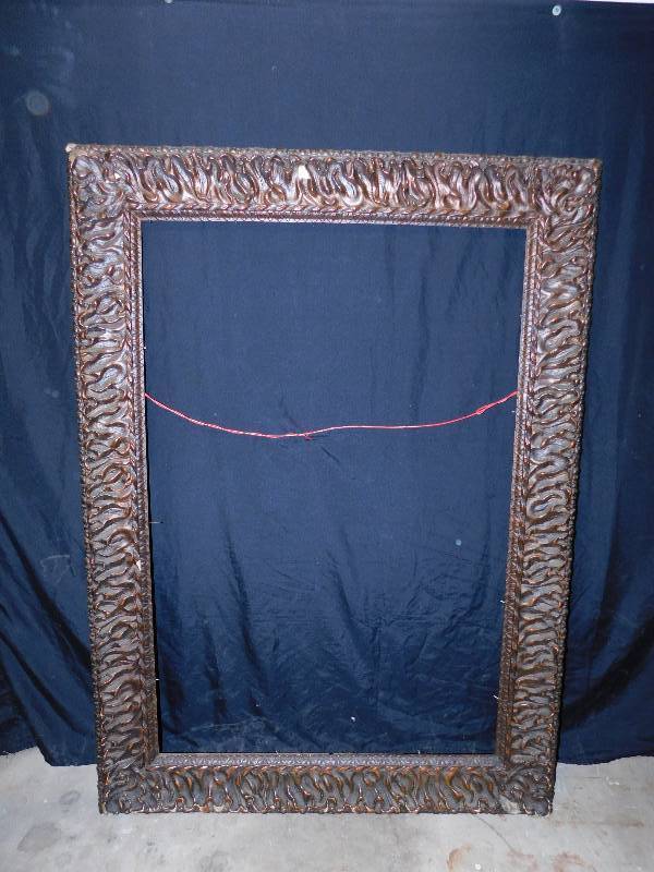 lot 34 image: Large Vintage Hand Carved Solid Wood Picture Frame