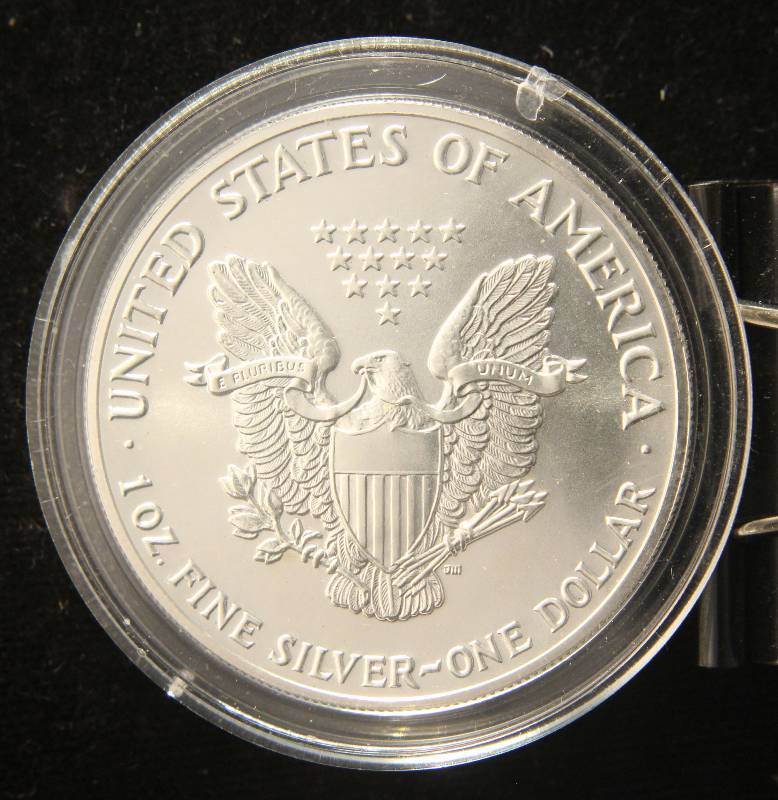 1989 AMERICAN SILVER EAGLE 1 TROY OZ. .999 FINE SILVER IN AIRTITE HOLDER