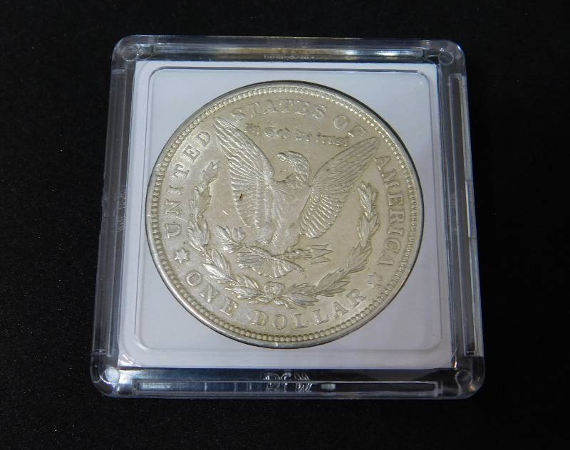lot 34 image: 1921 Morgan Silver Dollar High Quality, Brilliant in Air-Tite Holder