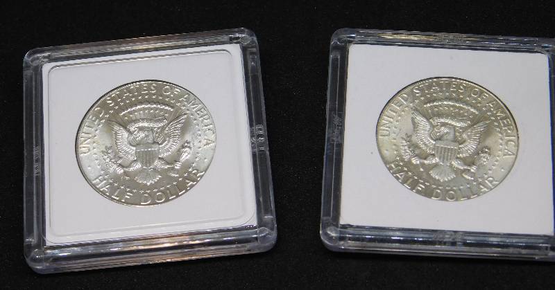lot 36 image: Two 1964 D Kennedy 90% Uncirculated Silver Half Dollars in Air-Tite Holders