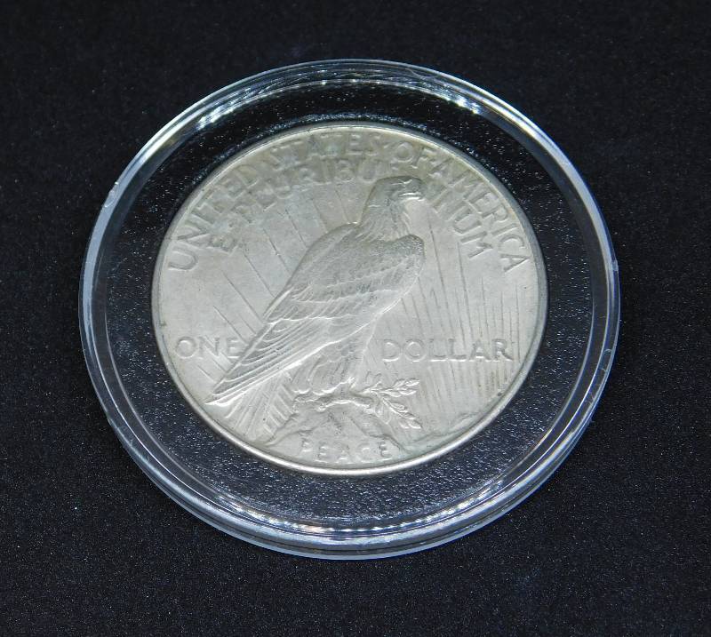 lot 25 image: 1922 Peace Silver Dollar in Air-Tite Holder