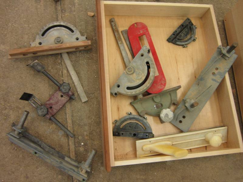 lot 49 image: Wood drawer filled with saw guides ...