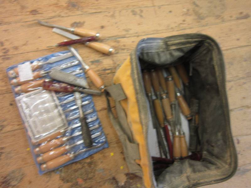 lot 91 image: Dewalt bag filled with chisels...