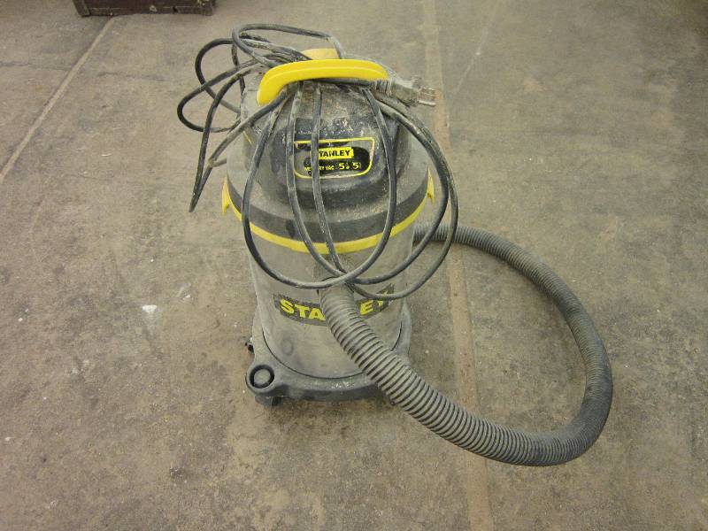 lot 132 image: Stanley 5 gallon canister vacuum...