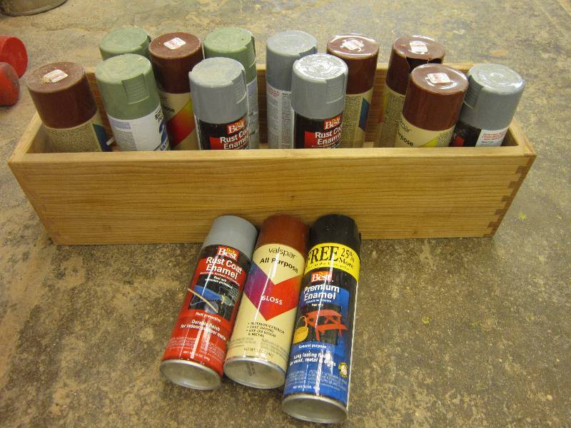 lot 135 image: Wood drawer filled with spray paint...