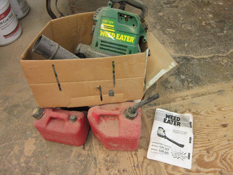 lot 137 image: Weed eater blower and 2 gas cans...