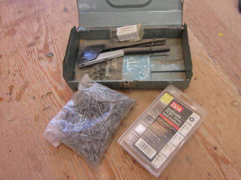 lot 143 image: Rivet gun with rivets...