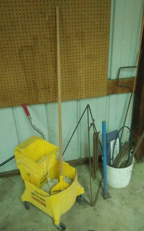lot 27 image: Mop Bucket With Mop, Snowmobile Track Stands, Heavy Duty Stakes