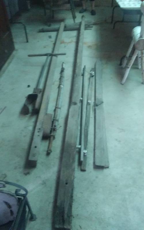 lot 70 image: Vintage Wood Collectibles Yokes (10 Ft), Skis (6 Ft), Post Hole Digger, More