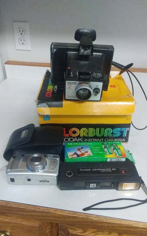 lot 186 image: Polaroid Camera, Canon Sure Shot, Kodak Ektralite 10 Cameras