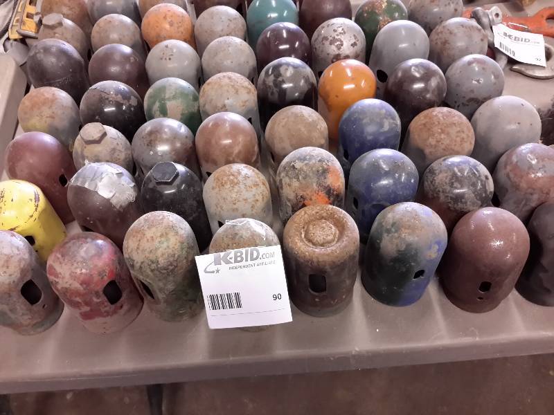 lot 90 image: Large lot of Propane Tank Covers.