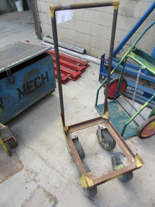 lot 288 image: Rolling cart with high upright handle.. 16in x 24 in, plus 48 in h handle