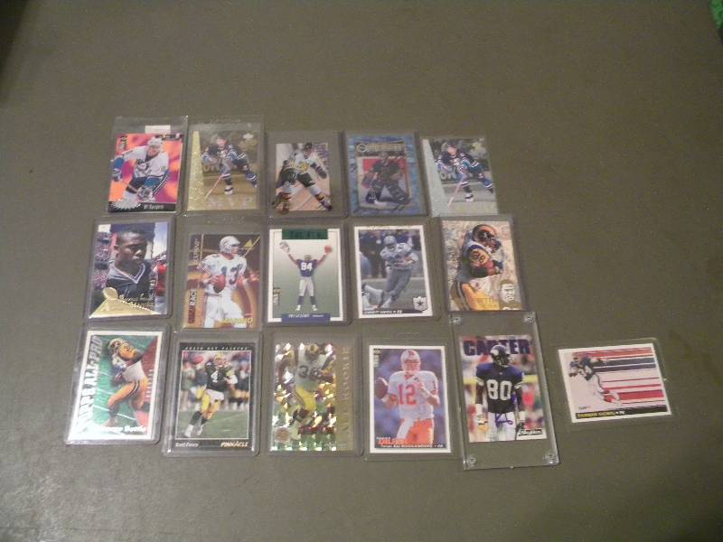 11 Football & 5 Hockey Cards in Plastic Sleeves