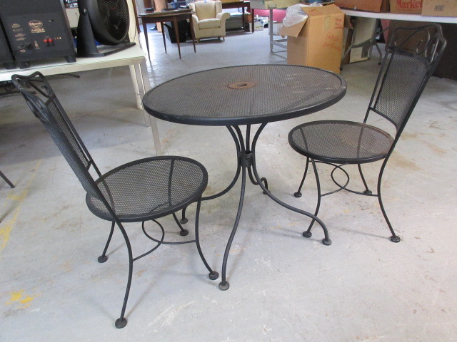 lot 303 image: WROUGHT IRON PATIO TABLE AND CHAIRS