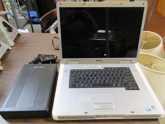 lot 321 image: DELL INSPIRON LAPTOP AND IO MAGIC EXTERNAL DVD RW
