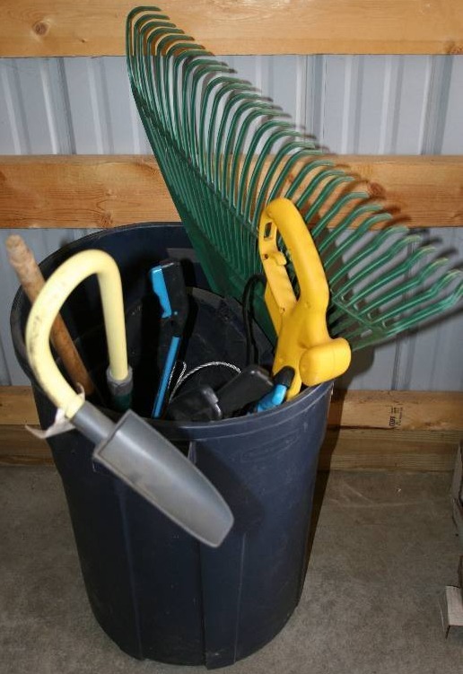Garbage Can and Yard Tools