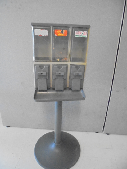 lot 57 image: Coin Operated Candy Dispenser
