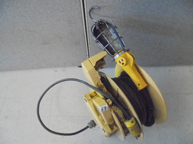 lot 59 image: Electrical Cord Reel with Cord and Treble Light