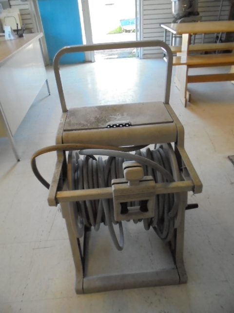 lot 64 image: Mobile Garden Hose Reel, Hose and Landscaping Fabric
