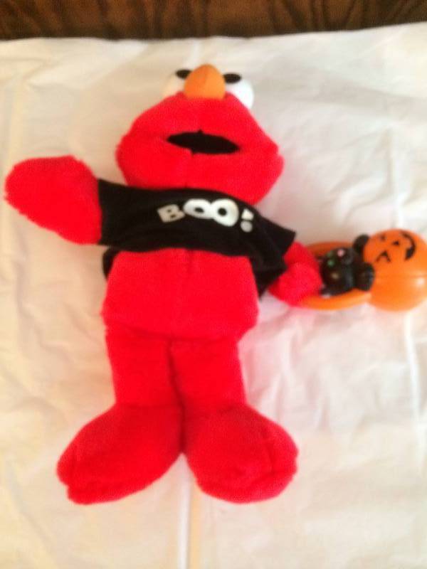 lot 2 image: Collectibles - Minnie Mouse, Tickle Me Elmo, Harley Davidson Bear