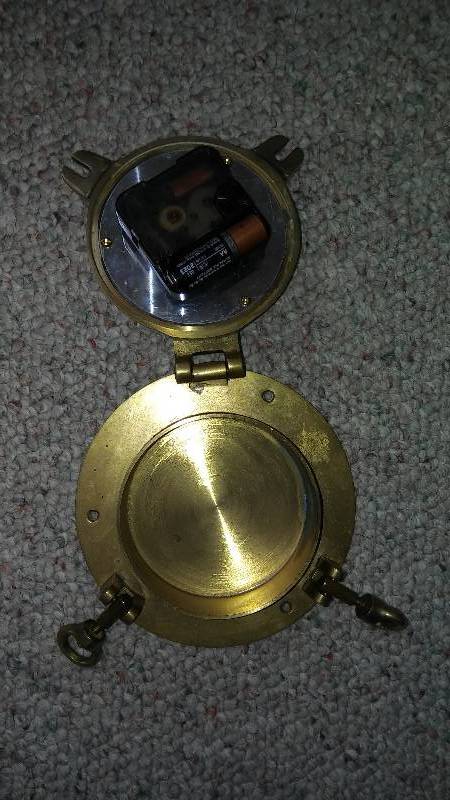 lot 14 image: Brass Sailor Porthole Clock