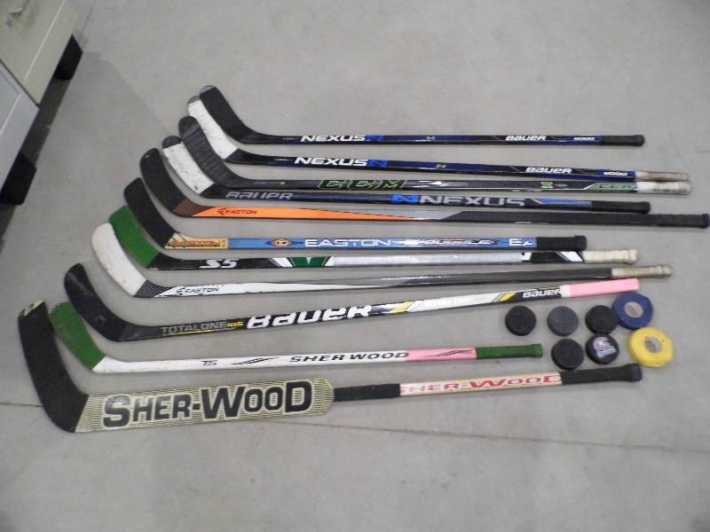 lot 106 image: Lot of Hockey Sticks