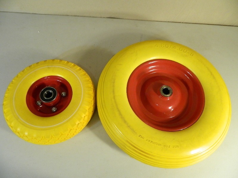 2 New Flat Free Tires with Wheels